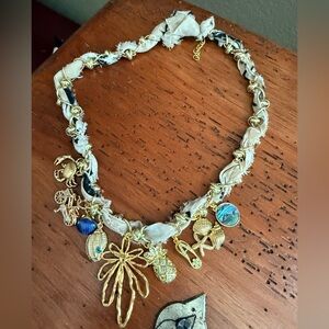 New. Never worn. Handmade Gold Charm Necklace with Nautical Accents